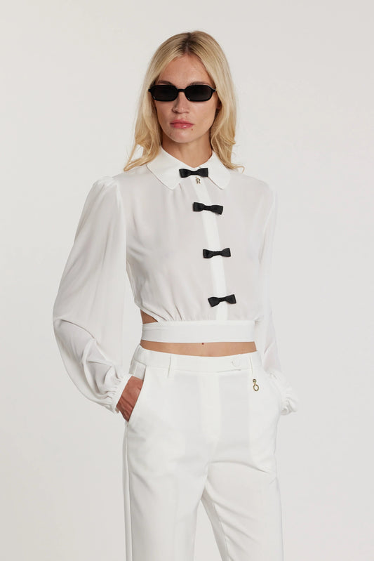 Blusa JANETTE corta maniche lunghe con fiocchi più ciondolo logo più apertura con pannello sulla schiena